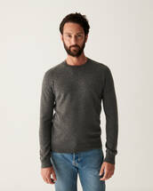 Fitted crew neck jumper with offset shoulders