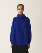 Ribbed polo neck pullover with raglan sleeves and side slits