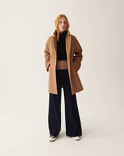 Double-sided oversized coat with geometric seaming