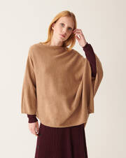Long poncho with one sleeve