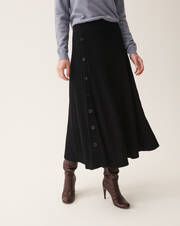 Ribbed flared long skirt with side button fastening