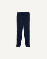 Jogging trousers with applied embroidered bands